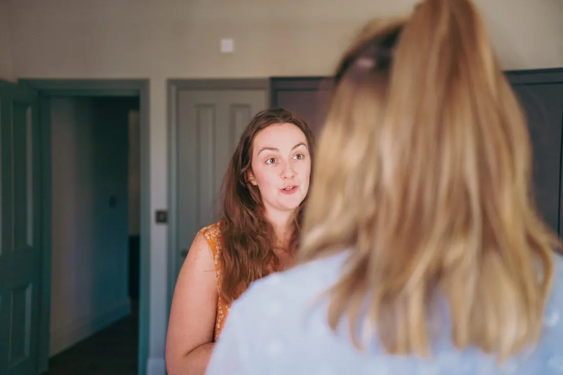 Scarlett from The Dog House chatting with a tenant